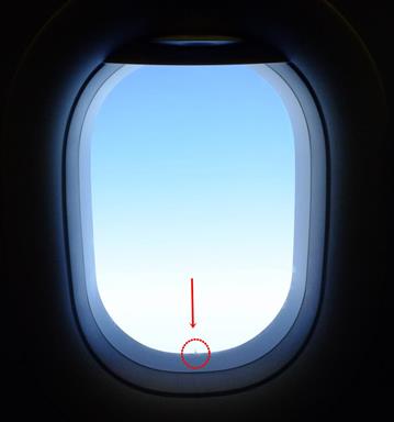 Tiny holes on Airplane windows